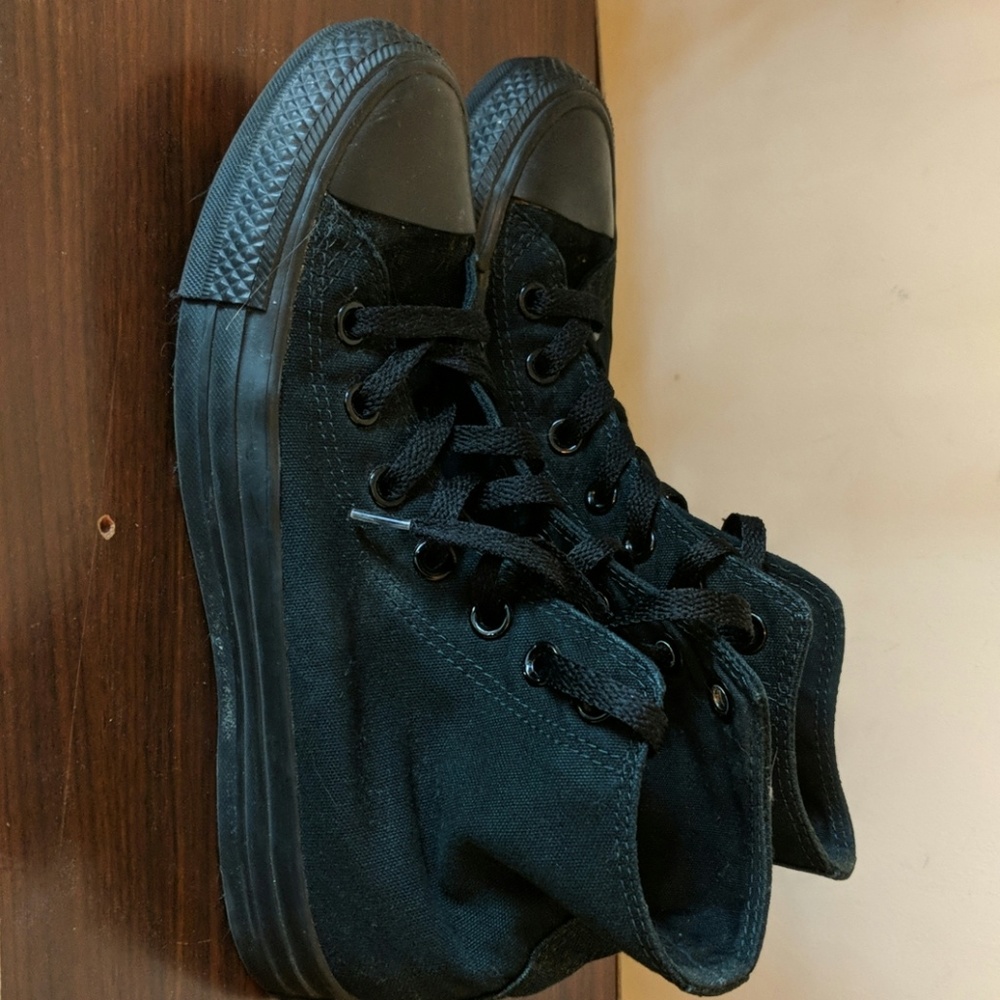 High top Converse All Stars.